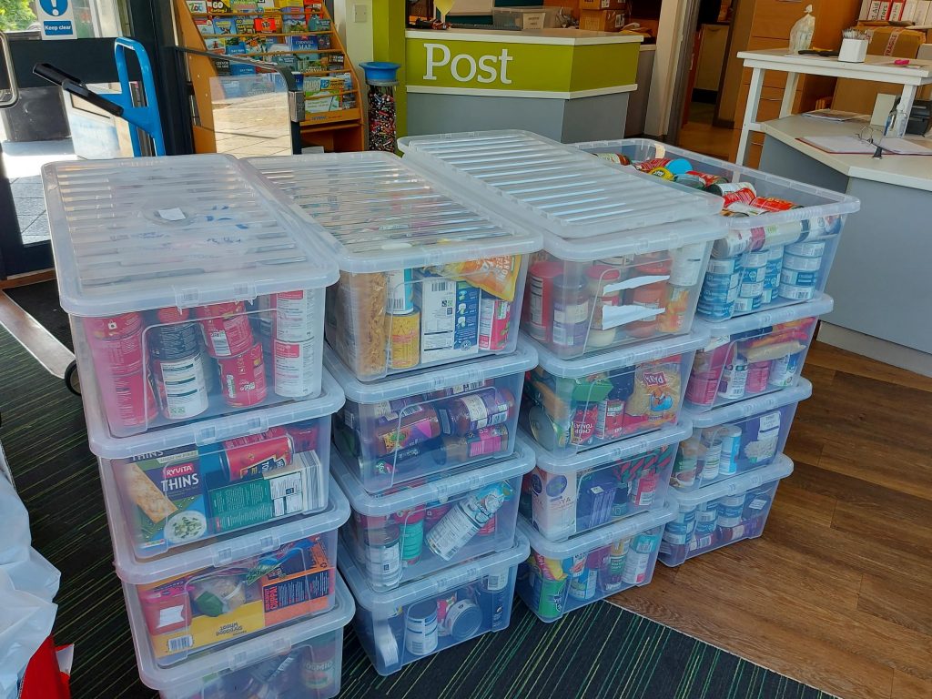 Boxes full of food ready to be taken to a food bank