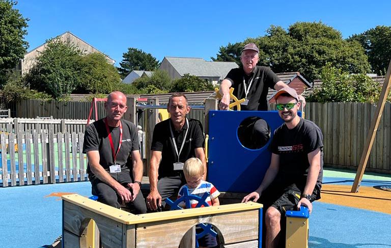 The four facilities team members at Mabe play area