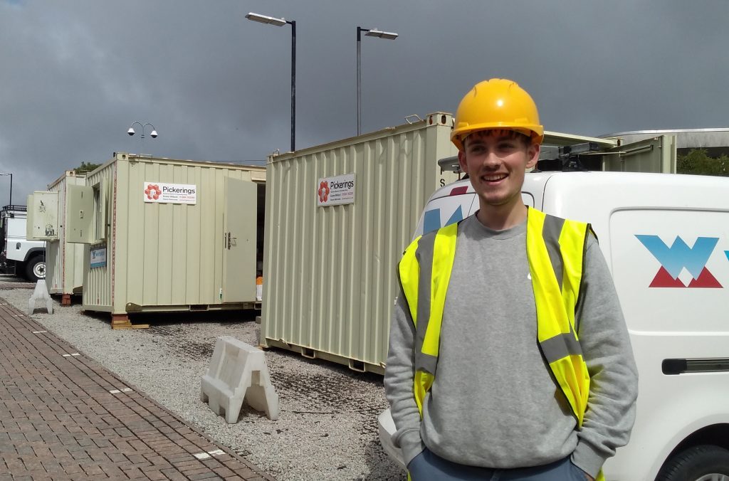 Sean Burrows with hi vis hard hat at Penryn Campus