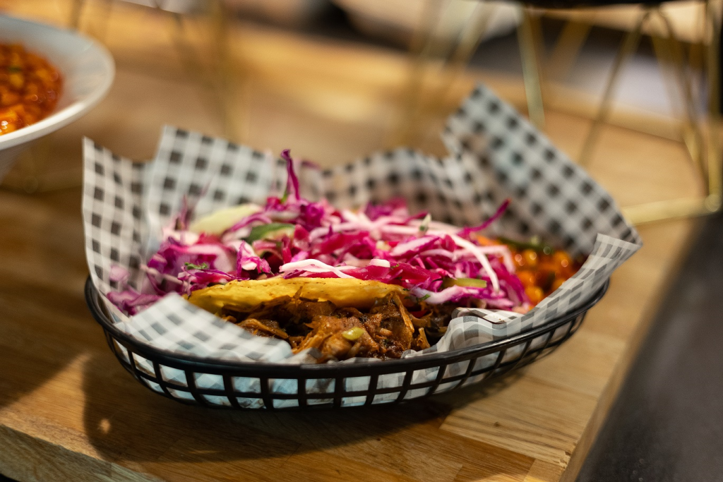 A tasty, Vegan Corn Taco served in a basket in the Stannary, Penryn campus.