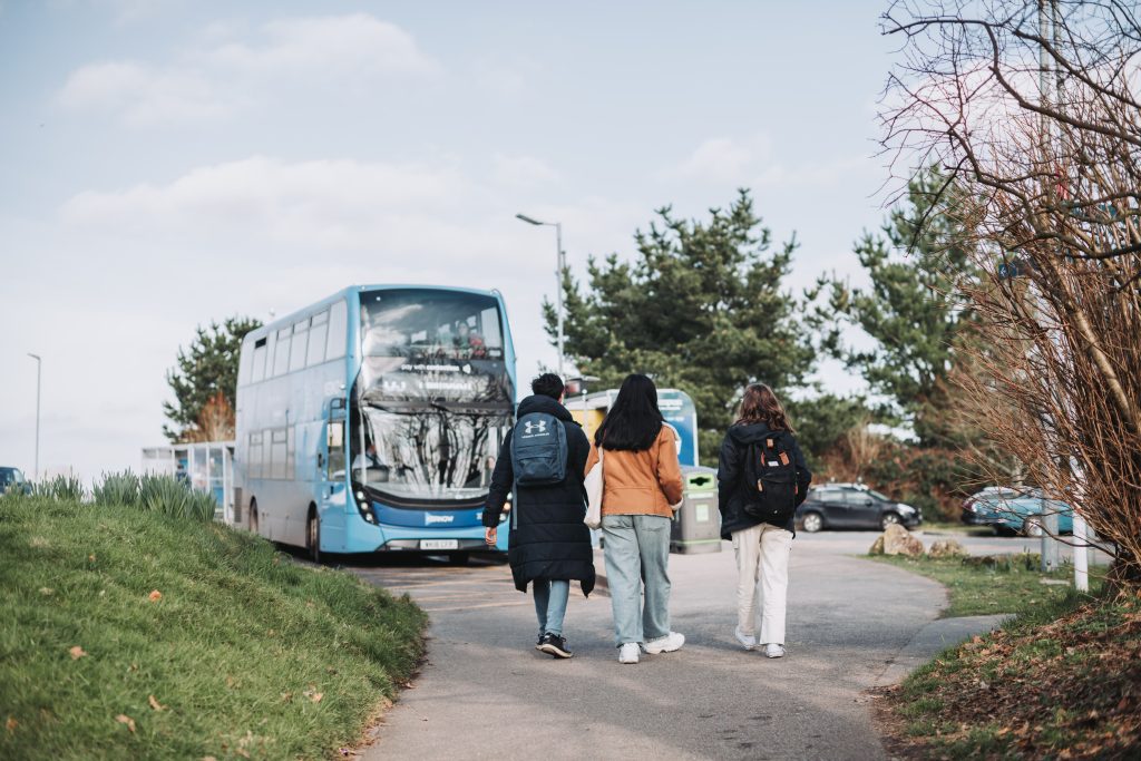 Students walking to bus stop at Penryn Campus