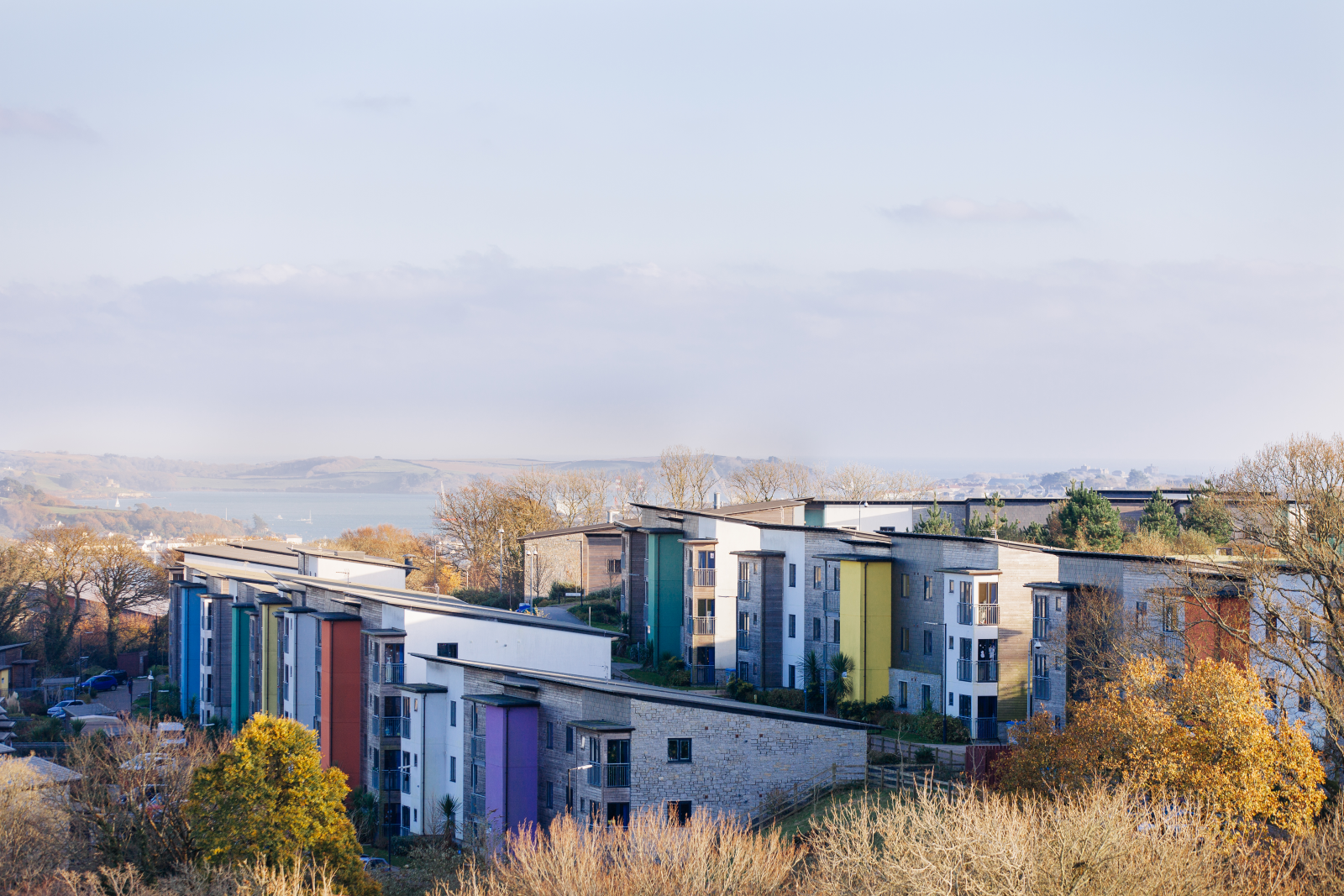 Aerial view of Glasney Village student accommodation at Penryn campus with views across to Falmouth.