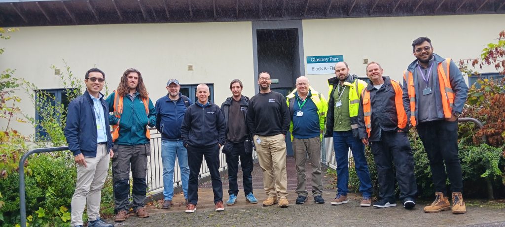 Team of FX Plus staff who worked on the Eco-block pilot project stood in front of Glasney Parc A in Glasney Village.